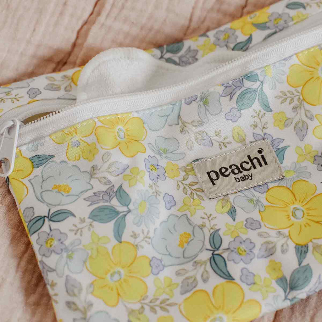 Peachi Baby Mini Wet Bag in the 'Elsie Ditsy Yellow' floral print