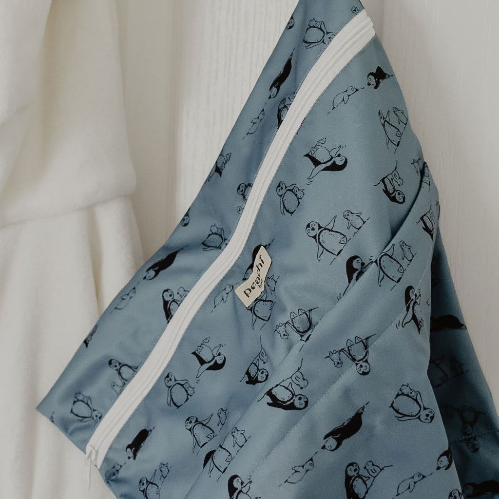 penguin print wetbag for baby's dirty clothes or swimming things