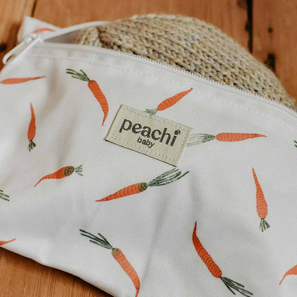 Peachi Baby Mini Wet Bag for Reusable Nappies in a carrot print