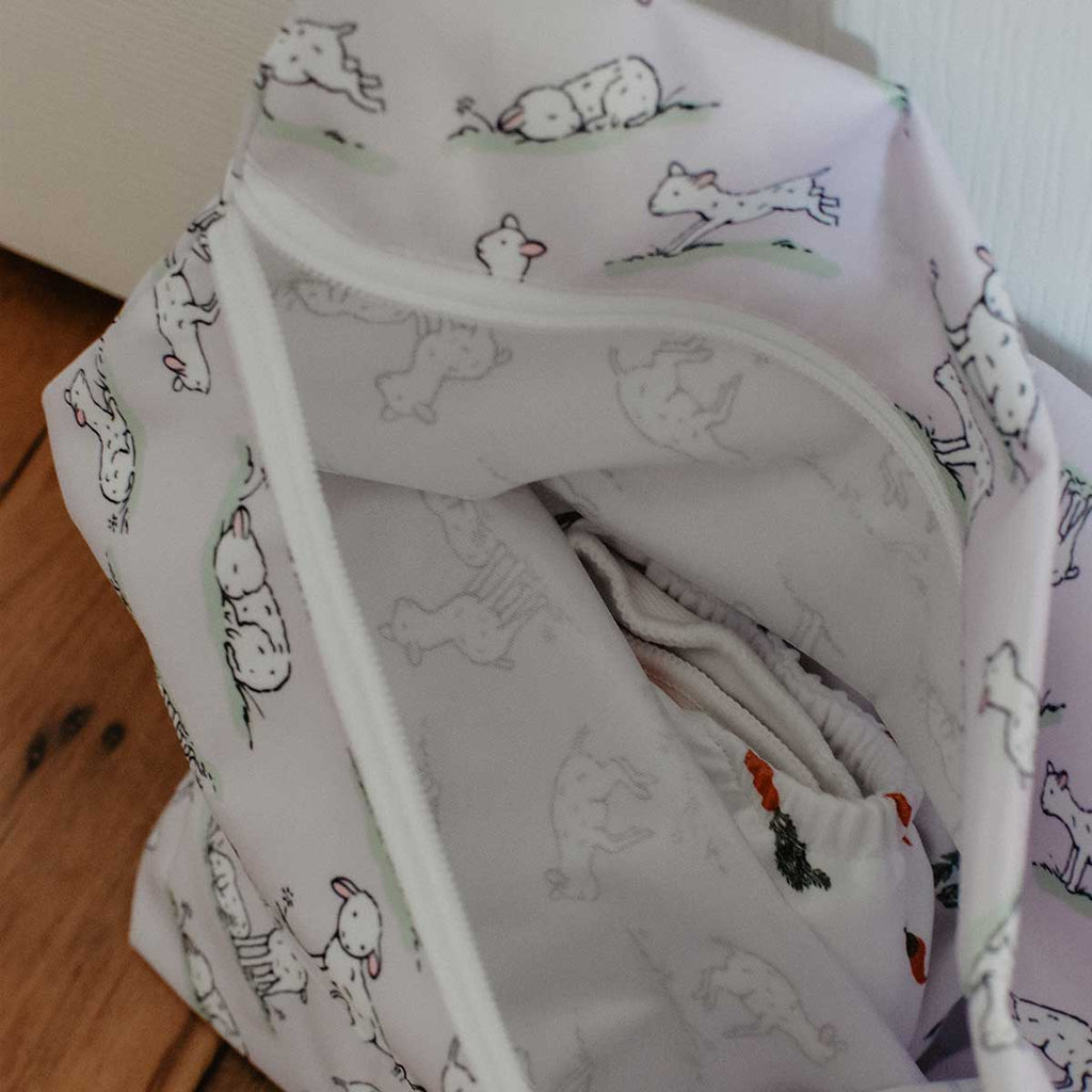lilac coloured lambs wetbag with two compartments