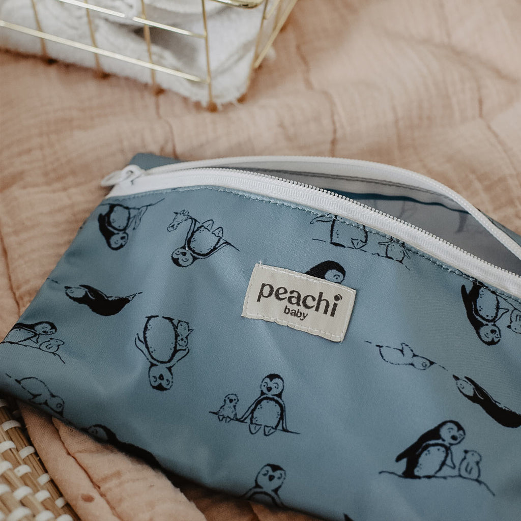 Peachi Baby Mini Wet Bag for Reusable Nappies in a penguins print