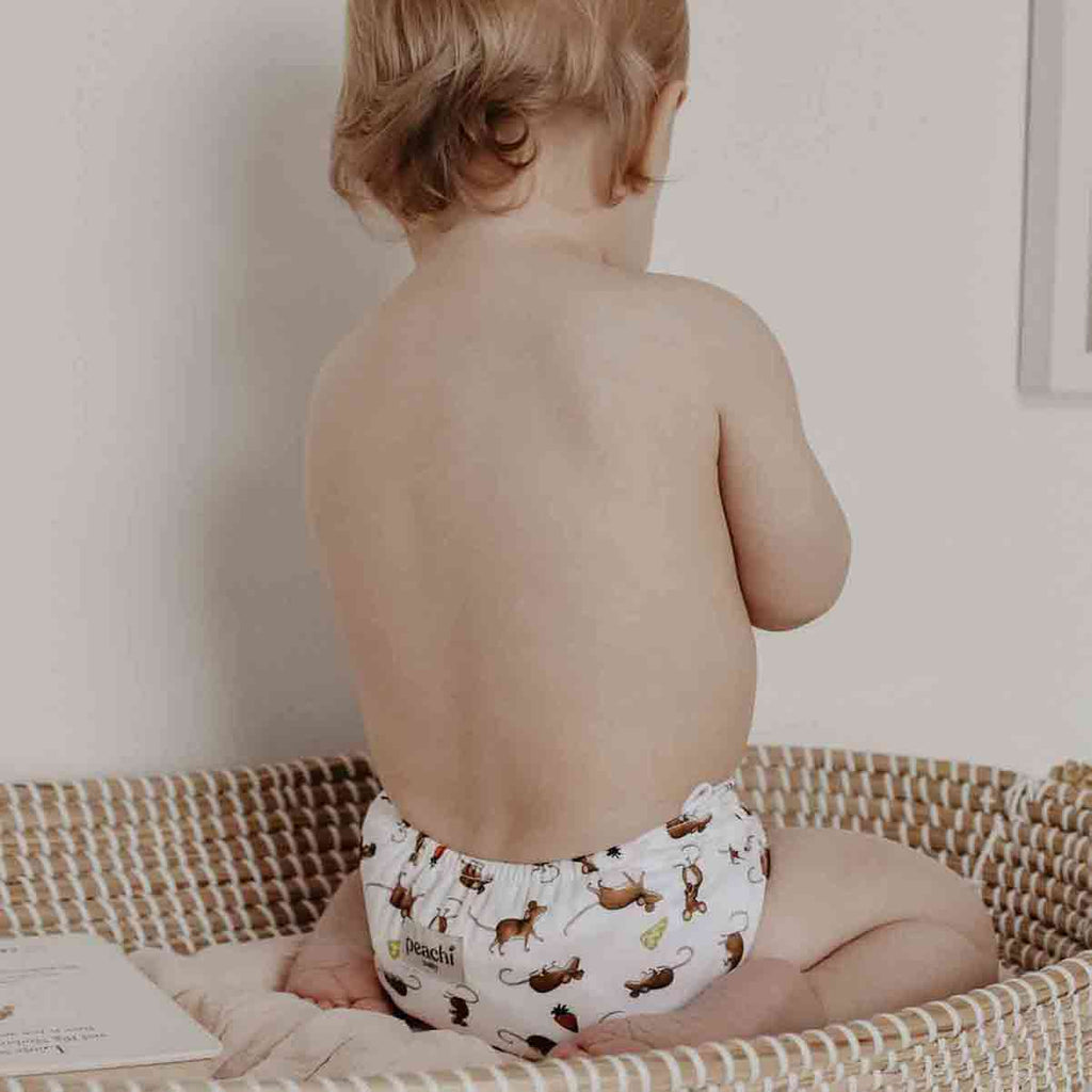 toddler wearing a mouse print reusable nappy by peachi baby